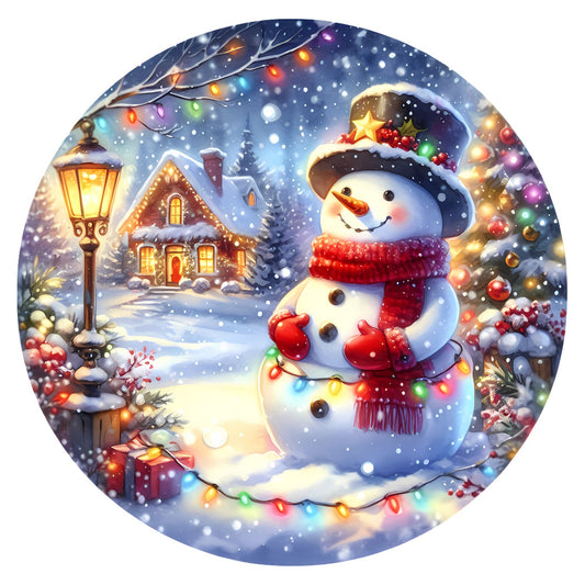 Christmas Winter Scene 34 Fabric Panel featuring a festive snowman with lights, holiday decorations, and a cozy snowy cabin at night.