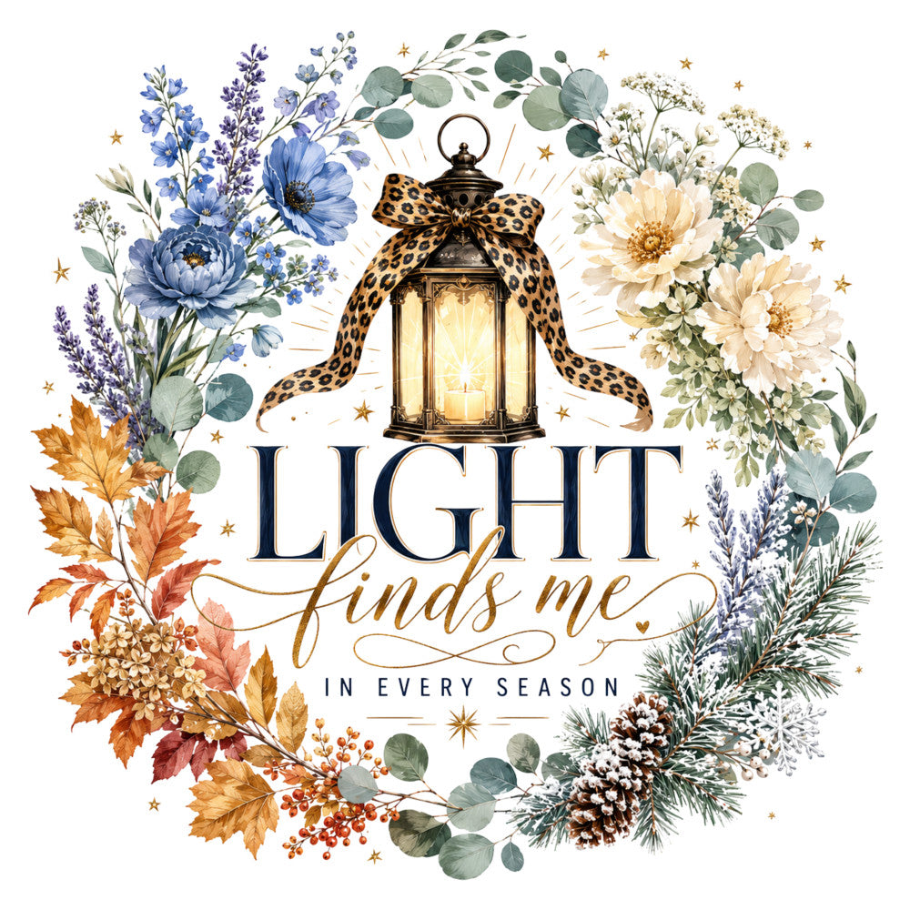 light finds me in every season, inspirational quote, lantern with bow, floral wreath, blue flowers, cream peonies, autumn leaves, winter evergreen, lavender sprigs, baby's breath, gold stars, leopard print bow, sage green eucalyptus, navy blue text, all seasons, year-round, elegant, whimsical, nature-inspired, botanical illustration, vintage style, decorative motifs, wall hanging, inspirational art, multi-season, warm and cool tones, gold accents, rustic charm