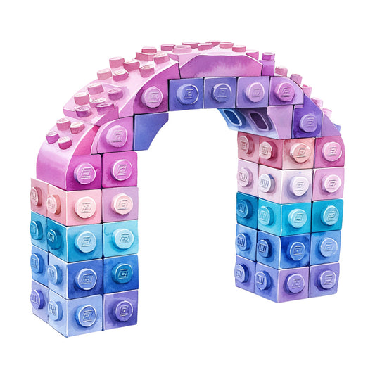 building blocks, lego bricks, arch structure, rainbow colors, pink blocks, purple blocks, blue blocks, turquoise blocks, gradient colors, toy theme, childhood motif, interlocking bricks, curved arch, playful design, fabric panel, quilting cotton, kids fabric, construction toys, colorful blocks, rainbow gradient
